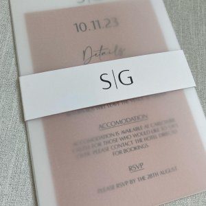 Pink wedding invite with belly band